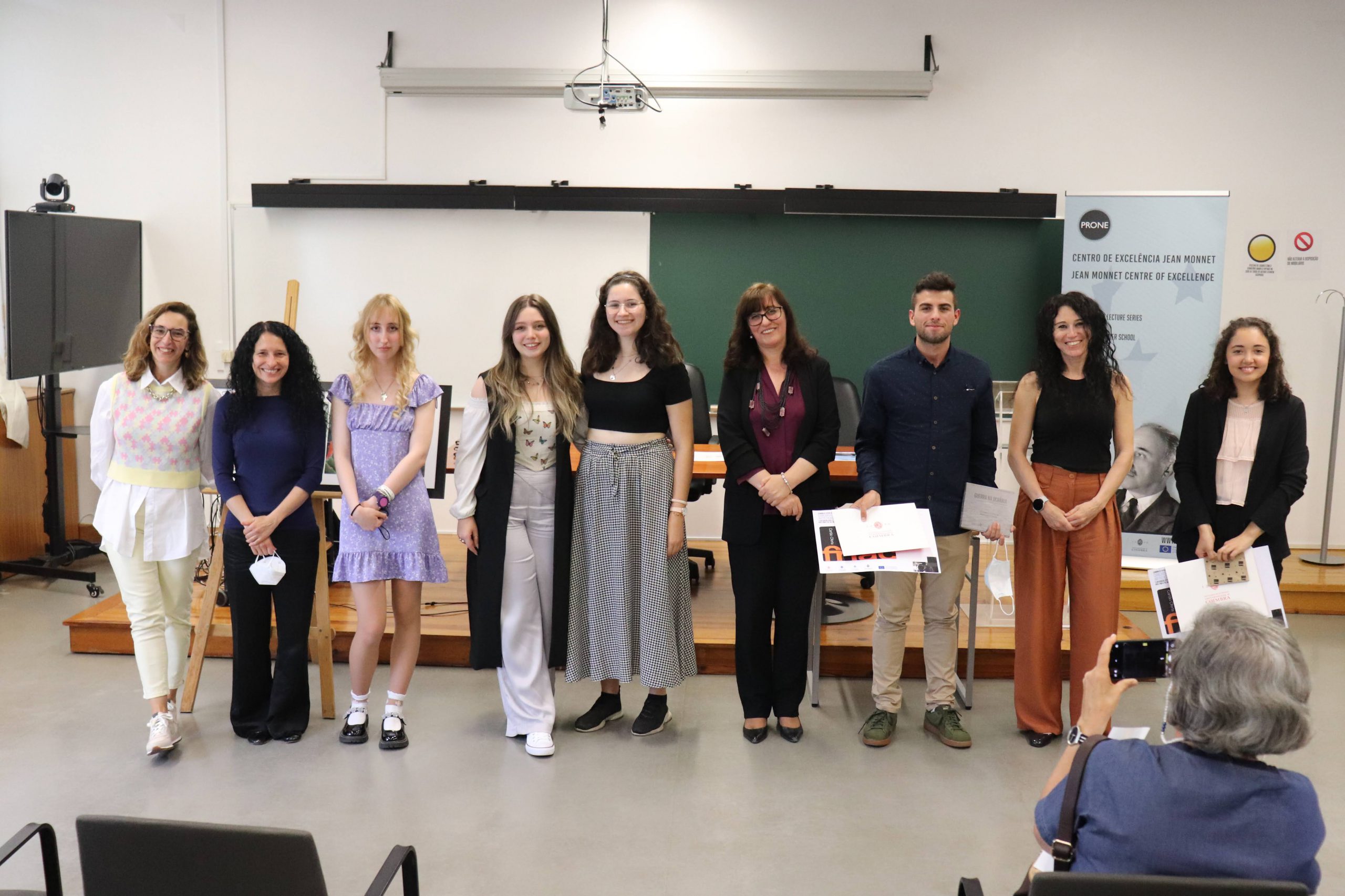 Awarded students receive prizes from the Centre of Excellence Artistic Contest at FEUC